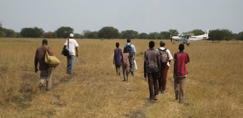 Walking to the airstrip in Rom