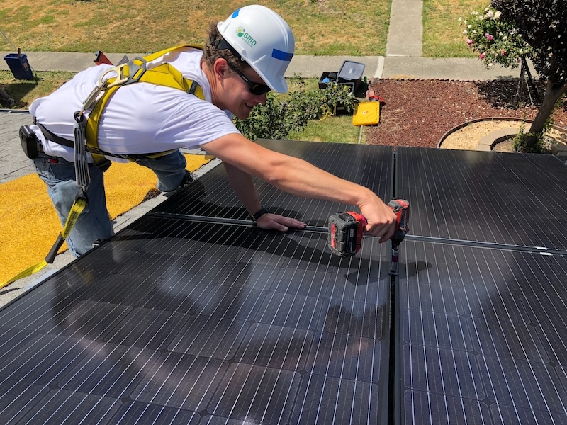 Patrick doing a volunteer solar install with Sungevity
